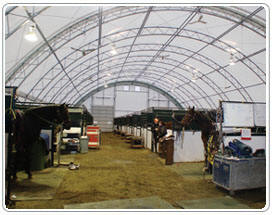 Inside one of the arch fabric buildings- Thunderbird Show Park - Commercial Equestrian Arenas, Barns & Stables